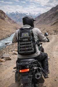 Motorcycle rider wearing a waterproof hydration bag while riding on an adventure road trip